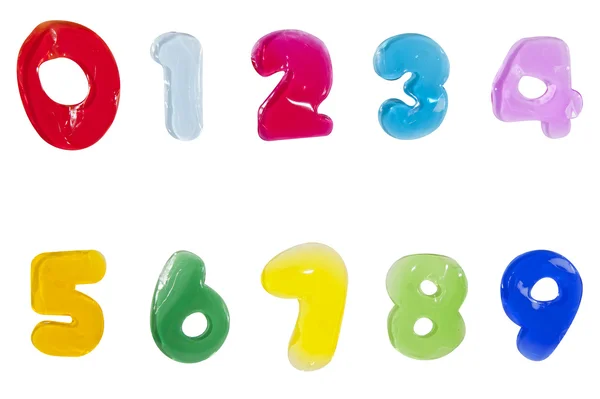Letras del alfabeto número gelatina palo sobre fondo blanco (1 2 3 4 5 6 7 8 9  ) — Foto de Stock