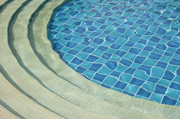 Background and pattern of clean water in blue swimming pool — Stock Photo, Image