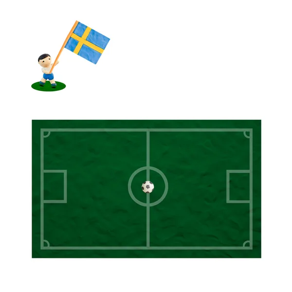 Football en plastique avec le drapeau sur fond d'herbe et de planche — Photo