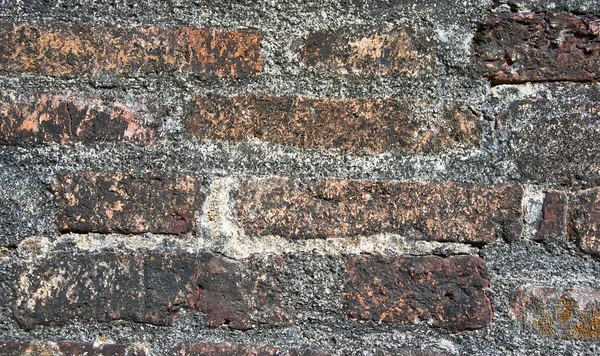 Oude bakstenen muur achtergrond en textuur — Stockfoto