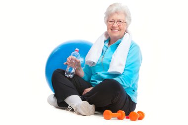 Senior woman in gym clipart