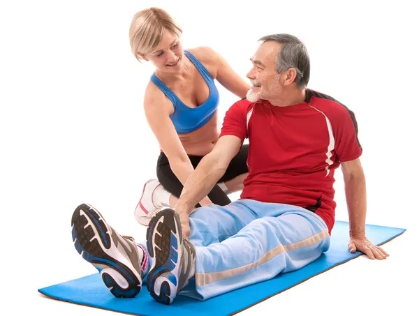 Hombre mayor haciendo ejercicio físico — Foto de Stock