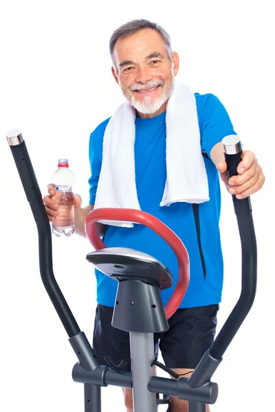 Uomo anziano esercizio su stepper — Foto Stock
