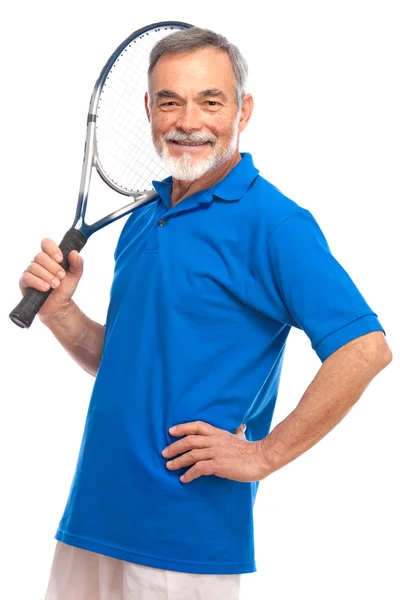 Starší muž s tenisovou raketou — Stock fotografie