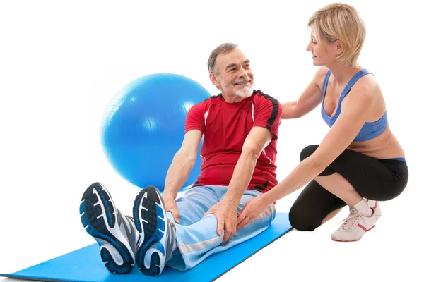 Senior man doing fitness exercise — Stock Photo, Image
