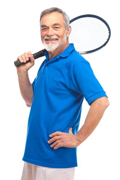 Äldre man med en tennisracket — Stockfoto