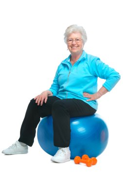 Attractive senior woman at health club clipart