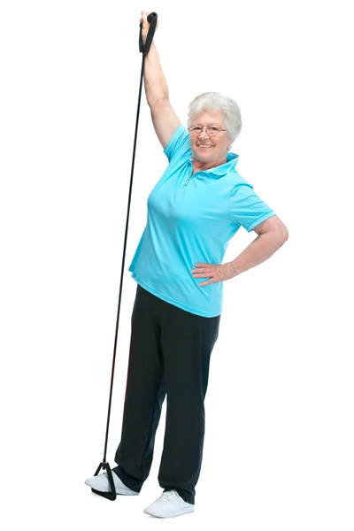 Attraktiv äldre kvinna i health club — Stockfoto
