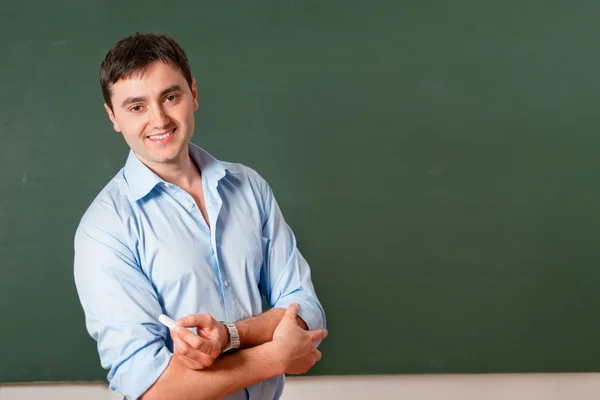 Student nebo učitel na tabuli — Stock fotografie