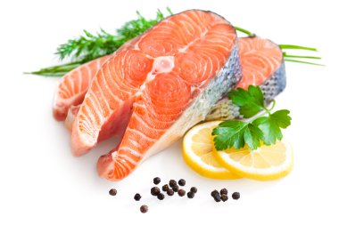 Fresh salmon with parsley and lemon slices