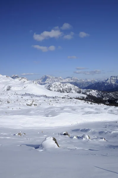 Rocks and snow, san pellegrino pass, dolomites — Stock Photo, Image