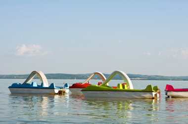 Pedalos on the lake Balaton clipart