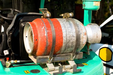 Gas bottle on a forklift truck clipart