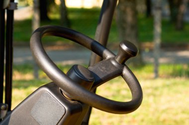 Steering wheel of a forklift clipart