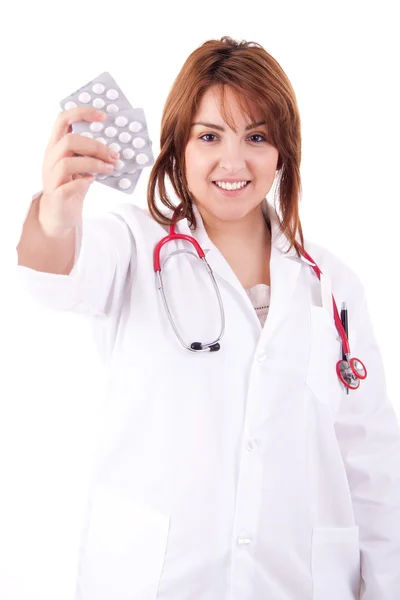 Medico mostrando pillole — Foto Stock