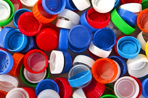 Colorful plastic lids — Stock Photo, Image