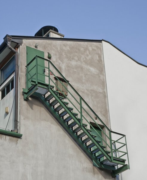 Fire escape stairs on wall of building