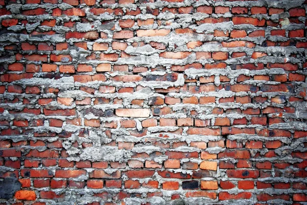 Кирпичная стена с текстурой цемента — стоковое фото