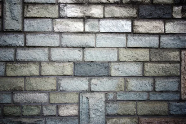 Stone bricks wall pattern texture with deep shadows — Stock Photo, Image