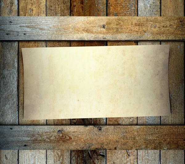 Paper on wood background — Stock Photo, Image