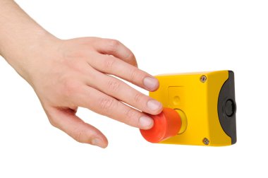 Hand pushing stop button