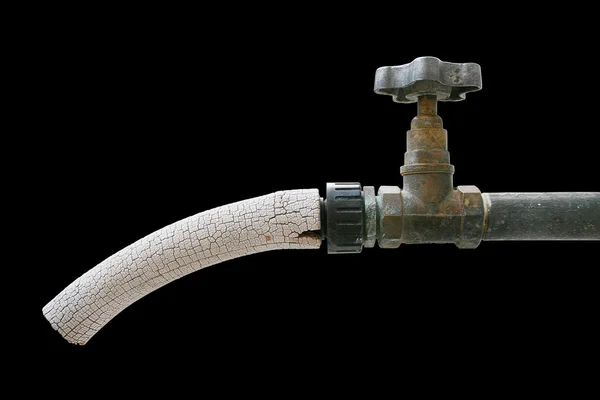 Old tap isolated on a black background. — Stock Photo, Image