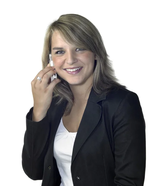Chica sonriente con teléfono móvil en la oreja — Foto de Stock
