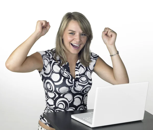Laughing cute blond girl with laptop in light back — Stock Photo, Image