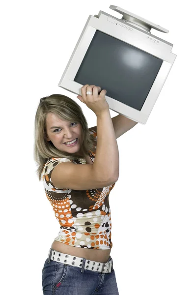 Girl throwing a computer monitor — Stock Photo, Image
