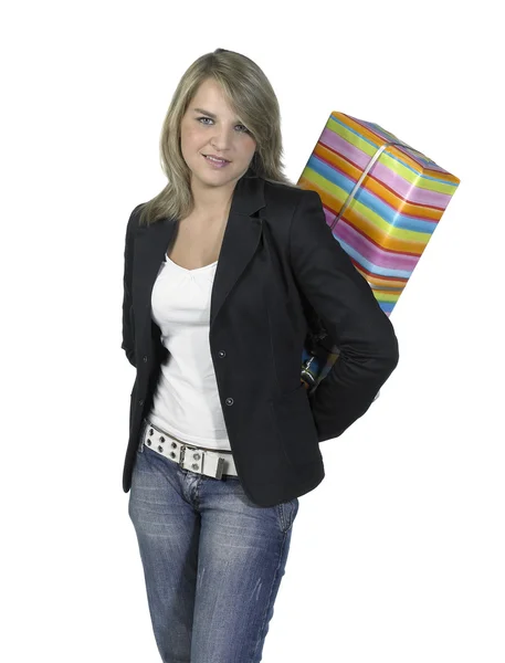 Cute girl hides present behind her back — Stock Photo, Image