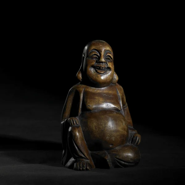 Buddha sculpture in dark back — Stock Photo, Image