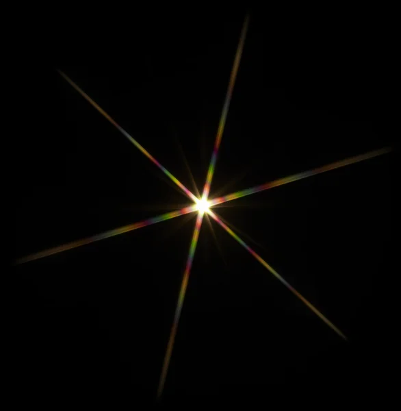 Flitsende ster in zwarte rug — Stockfoto