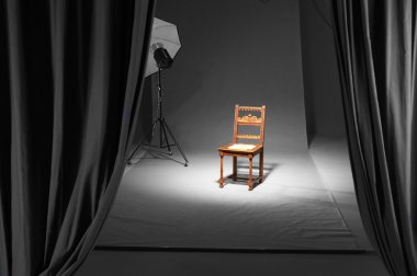 Chair in a photostudio clipart