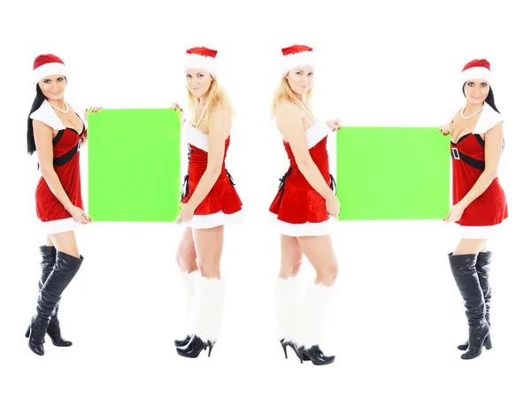 Chicas de Navidad sosteniendo banner verde en blanco —  Fotos de Stock