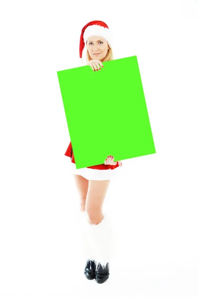 Vánoční žena držící zelené prázdný nápis — Stock fotografie