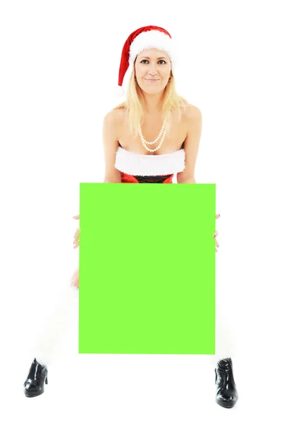 Рождественская женщина с зеленым чистым баннером — стоковое фото