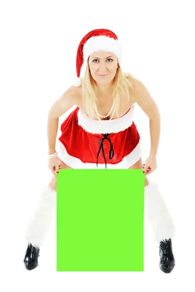 Christmas woman holding green blank banner — Stock Photo, Image