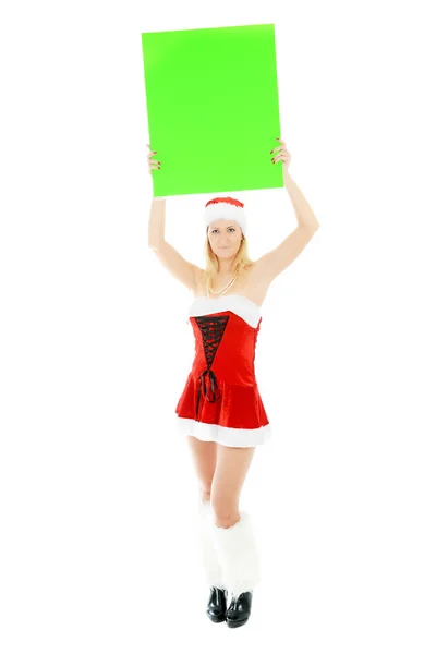 ผู้หญิงคริสต์มาสถือป้ายสีเขียวว่างเปล่า — ภาพถ่ายสต็อก