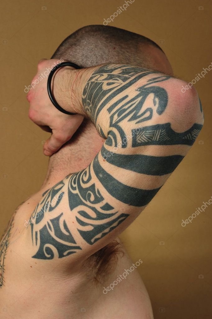 tribal arm tattoo