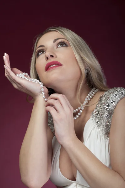 stock image Beautiful woman with perl beads