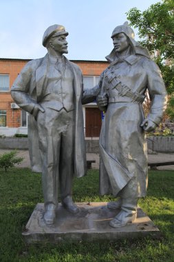 Monument to Lenin and the revolutionary soldier clipart