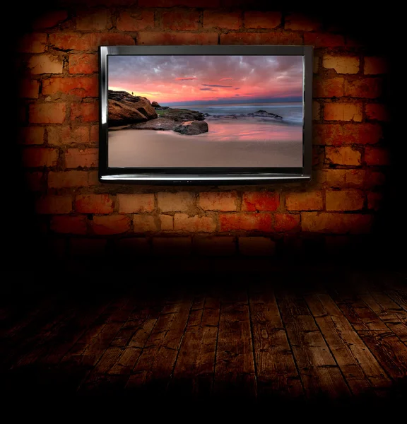 Plasma TVs on the wall — Stockfoto