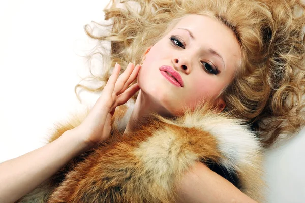 Sensuality young attractive girl with fur coat — Stock Photo, Image