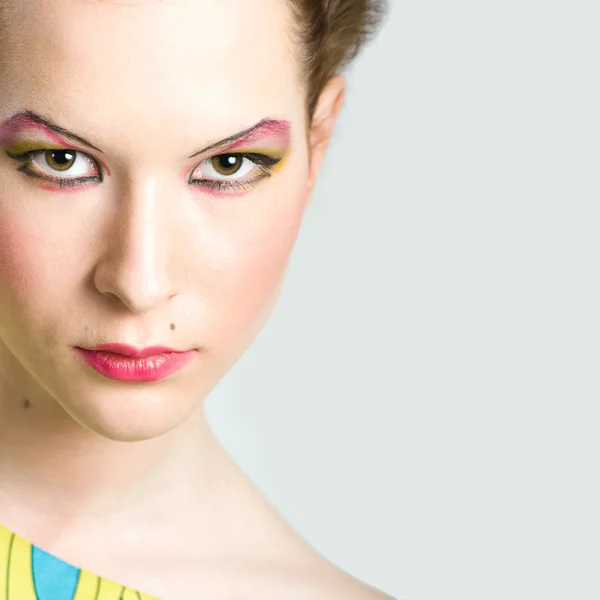 Fashion portrait of young beautiful woman with stylish makeup — Stock Photo, Image
