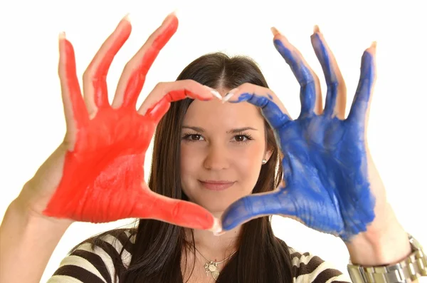 Chica con la mano pintada en pinturas de colores listos para las impresiones de mano — Foto de Stock