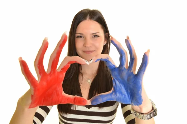 Meisje met de hand geschilderd in kleurrijke verf klaar voor hand afdrukken — Stockfoto