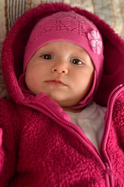 Portrait of adorable baby in pink dress — Stock Photo, Image