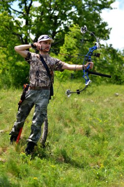 Young archer training with the bow clipart