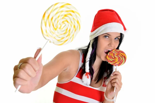 Jultomten med en lollypop — Stockfoto