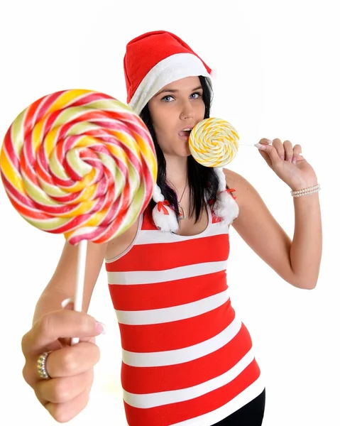 Jultomten med en lollypop — Stockfoto